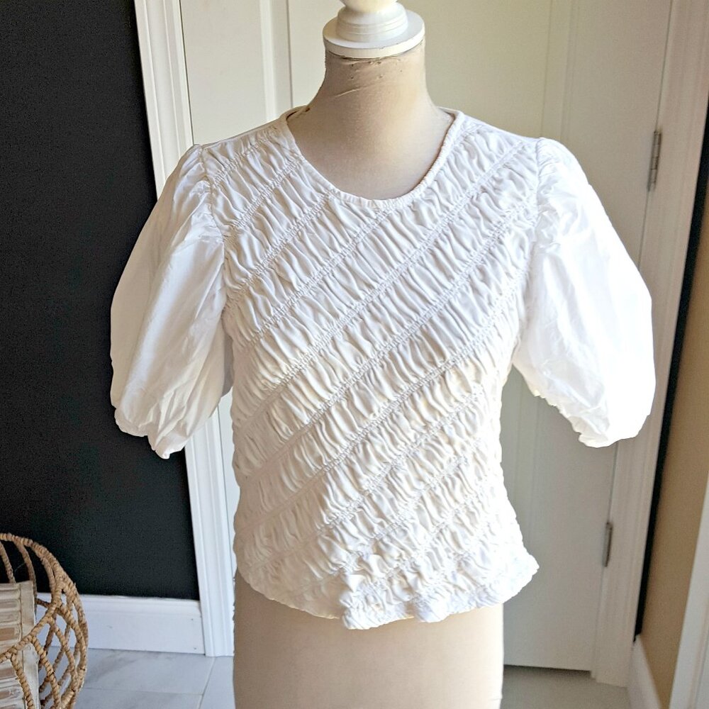 Anthropologie's PUFFY FRONT Puff SLEEVE BLOUSE